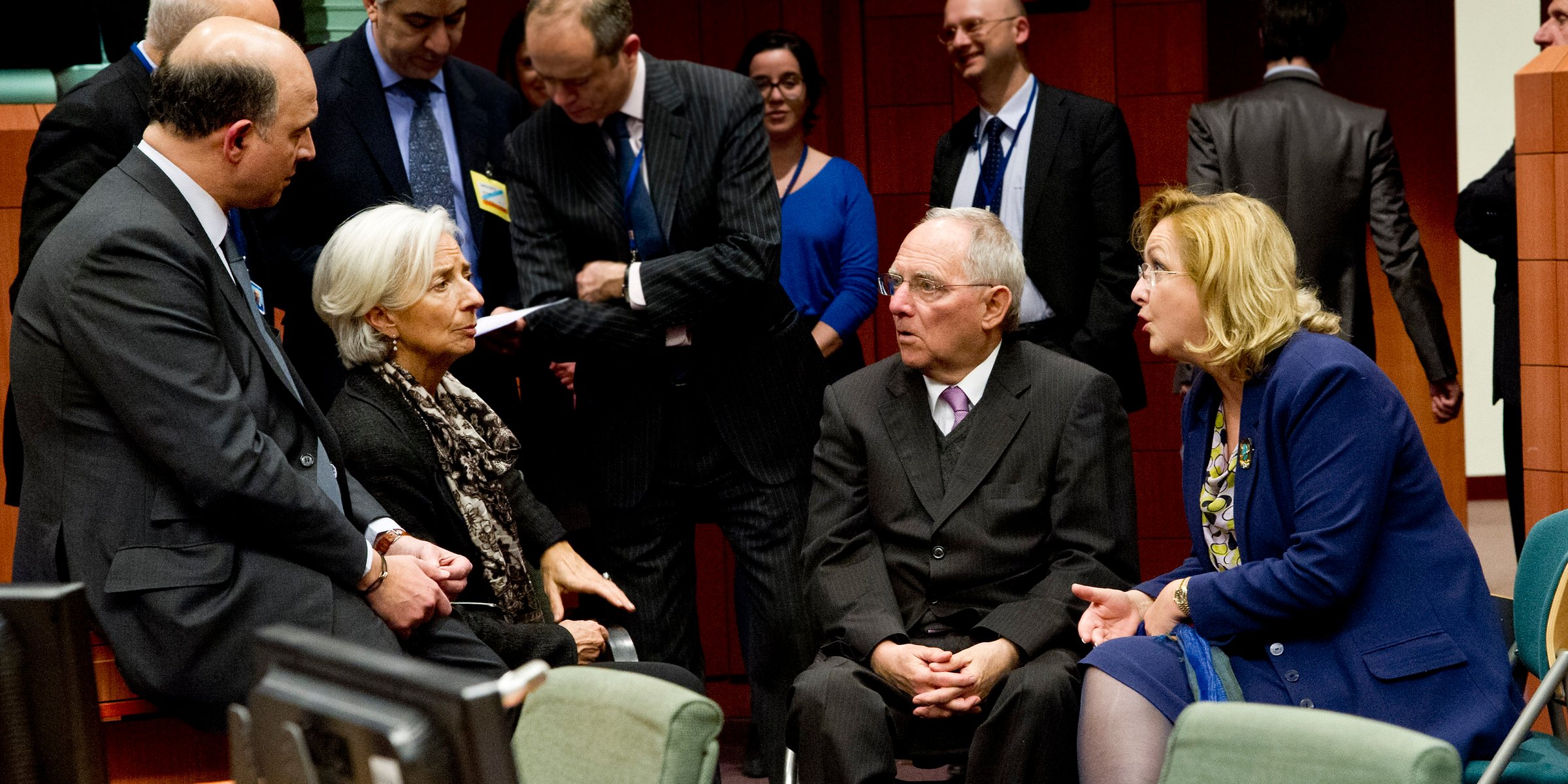 The IMF, led by Christine Lagarde (c), had to give in to German finance minister Wolfgang Schaeuble (r) (Photo: Council of European Union)