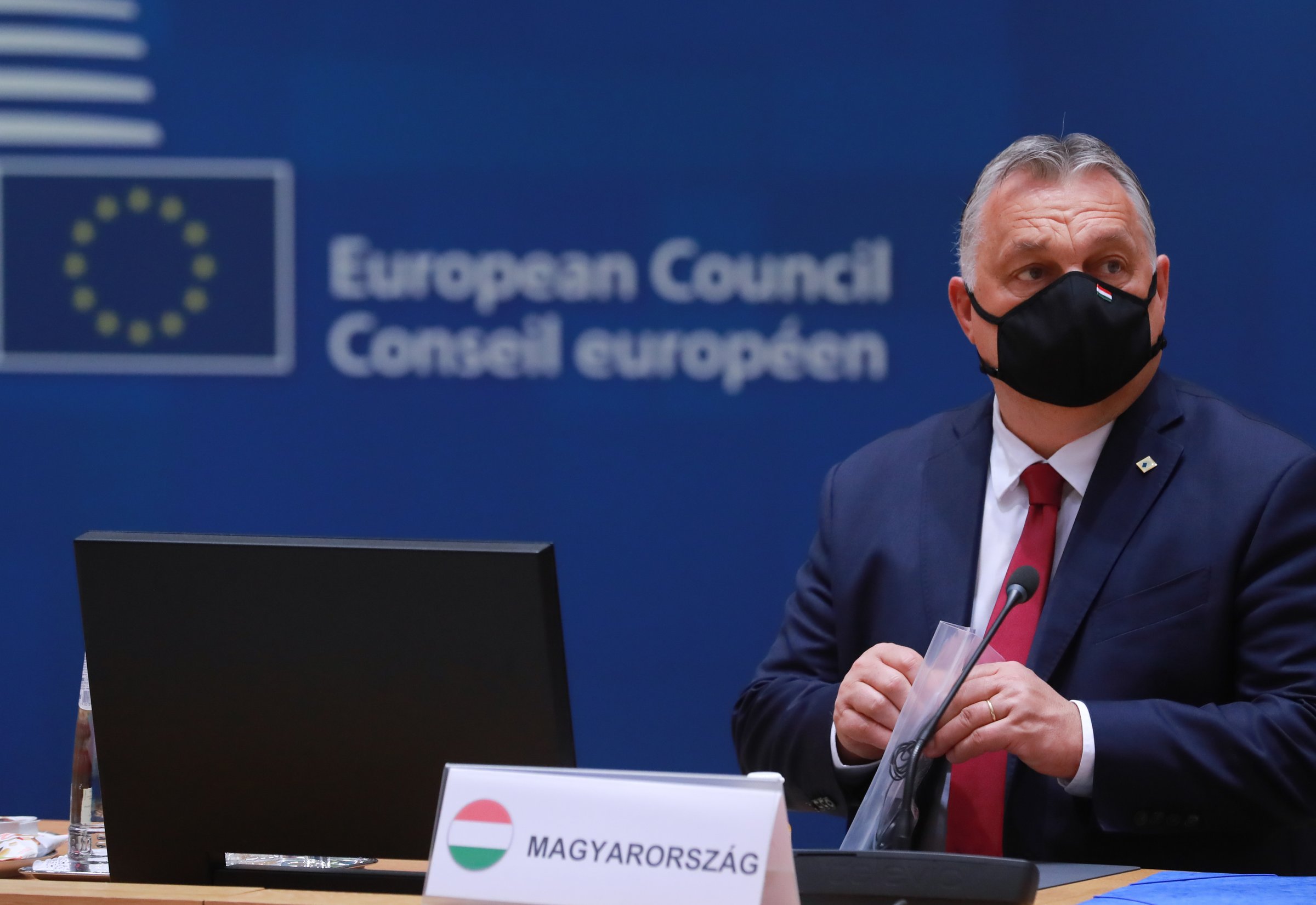 Viktor Orban, masked, at a previous EU summit. Under his leadership, Fidesz has embarked on a decade-long effort to chafe at democratic norms, such as judicial independence, minority rights, and freedom of expression and association (Photo: Council of the European Union)