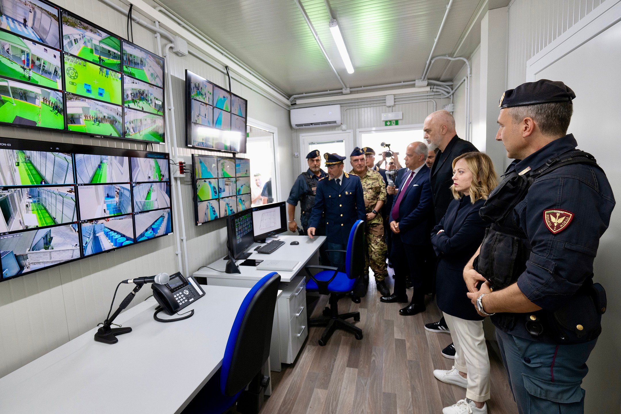 Italy's Giorgia Meloni visiting of the Italian-run centres in Albania last summer (Photo: Italy's Presidency of the Council of Ministers)