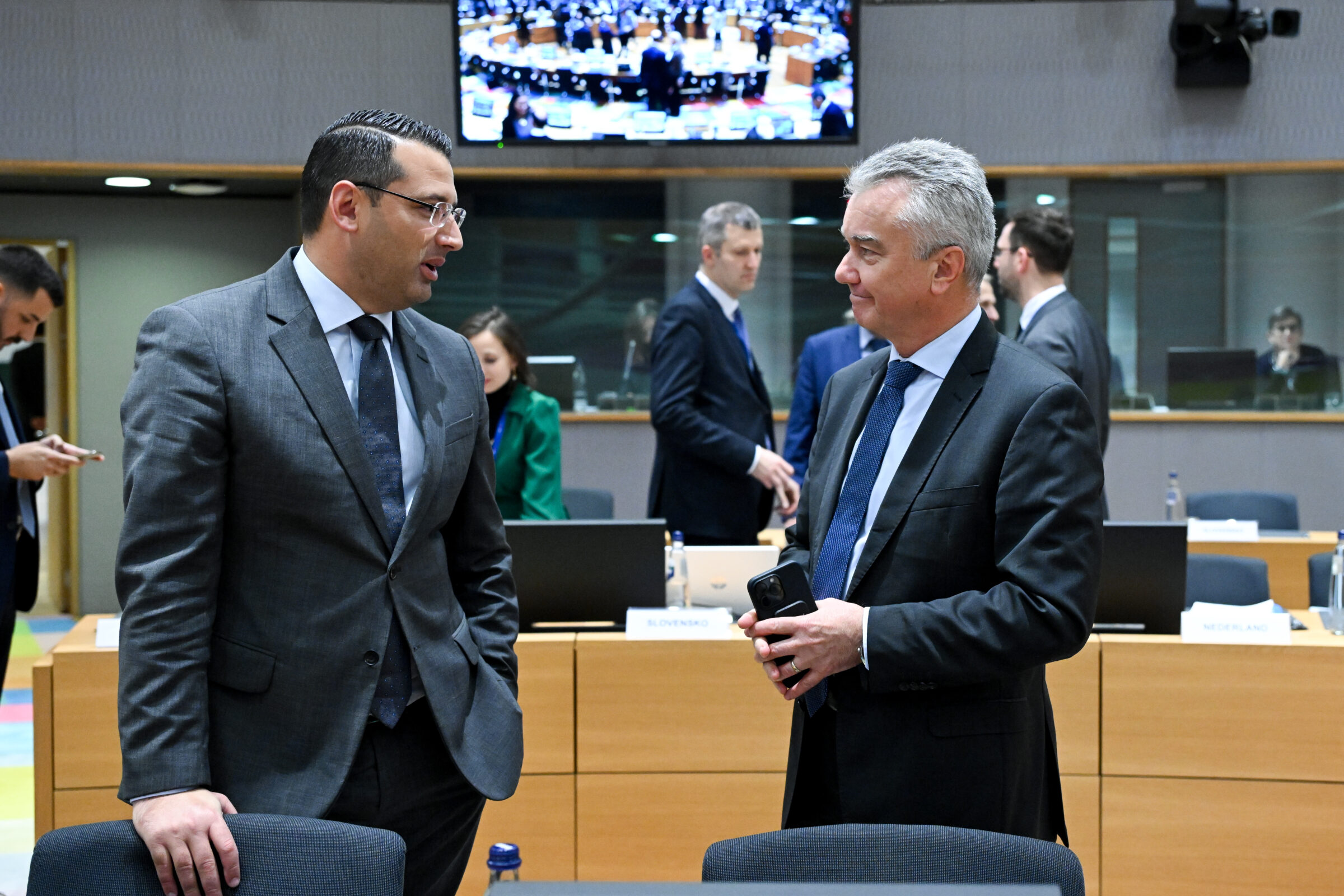 Slovakia's EU ambassador Juraj Nociar (r) at the EU Council in Brussels