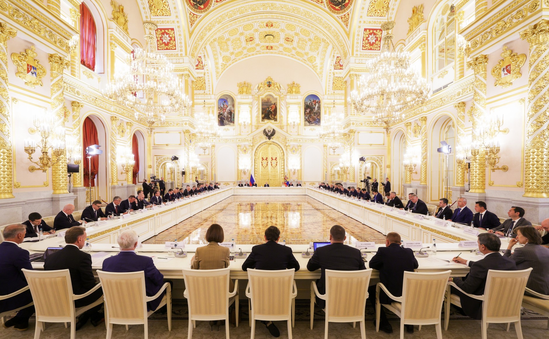 Russian leader Vladimir Putin chairs meeting on 'strategic development' in Kremlin on 19 August