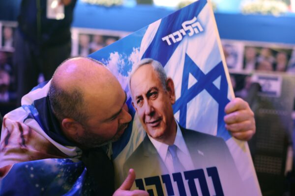 A supporter of Israeli prime minister Benjamin Netanyahu reacts to the first exit polls at a Likud party election event in Jerusalem on 27 October 2026